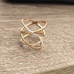 Gold twirly ring.